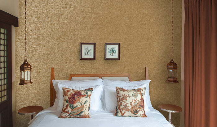 Ajanta wallpaper in Copper hung on a feature wall