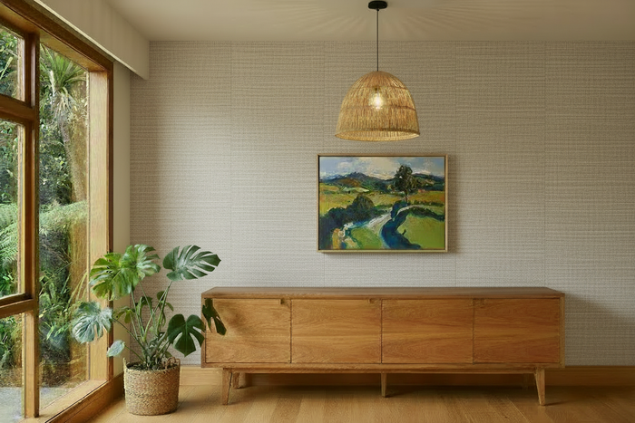 Room with white, light grey and brown grasscloth wallpaper