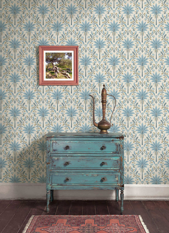 Ariara wallpaper in Blue hung on a feature wall