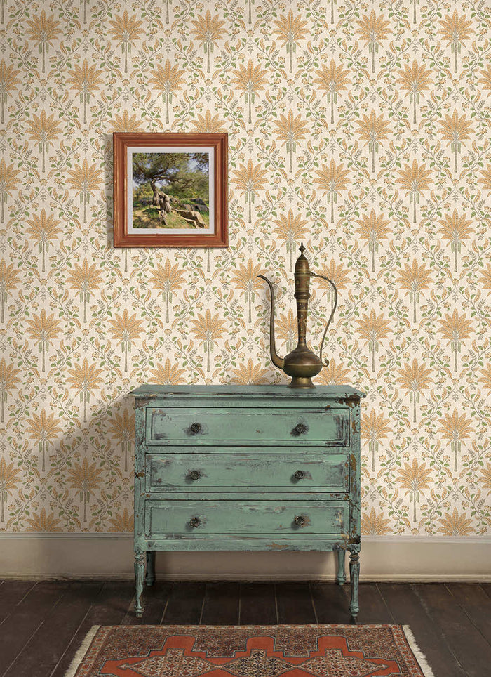 Ariara wallpaper in Orange hung on a feature wall