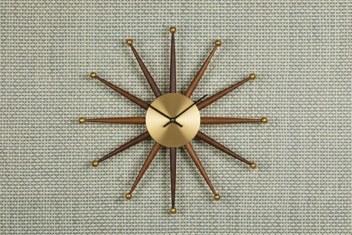 Product shot with mid-century clock and Sage Blue Metallic Turquoise grasscloth