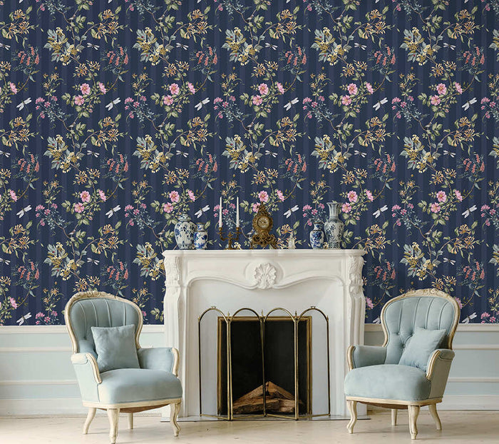 Navy Camberley floral stripe wallpaper on a bedroom wall