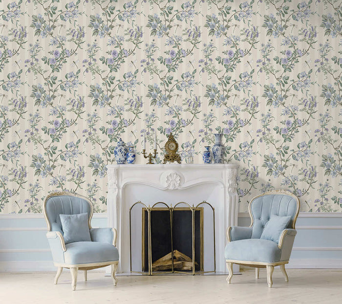 Neutral blue Camberley floral stripe wallpaper on a living room wall