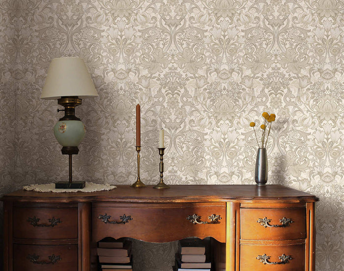 Neutral Fleurmont damask wallpaper on a bedroom wall