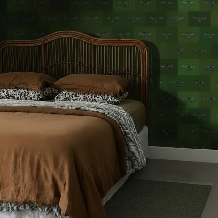 Bedroom with rattan headboard, Hewson Bee wallpaper, green rug, and softer shadows