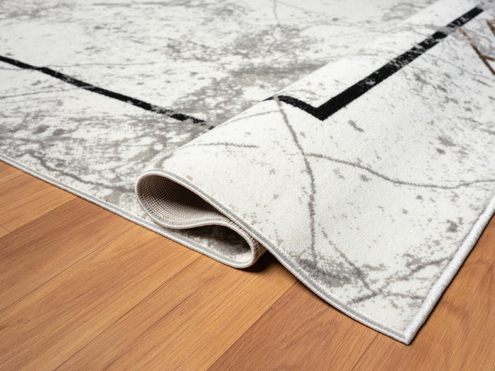 Kike 8X11 Area Rug - Adams Furniture