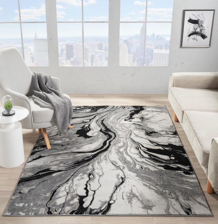 Ksamil 8X11 Area Rug - Adams Furniture