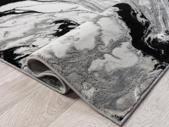 Ksamil 8X11 Area Rug - Adams Furniture