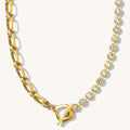 Close up of the gold Loretta crystal link necklace on a white background