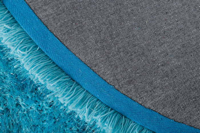 Manhattan Turquoise Half Moon Area Rug - Adams Furniture