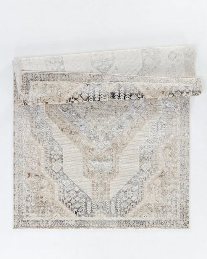 Omari 5X8 Area Rug - Adams Furniture