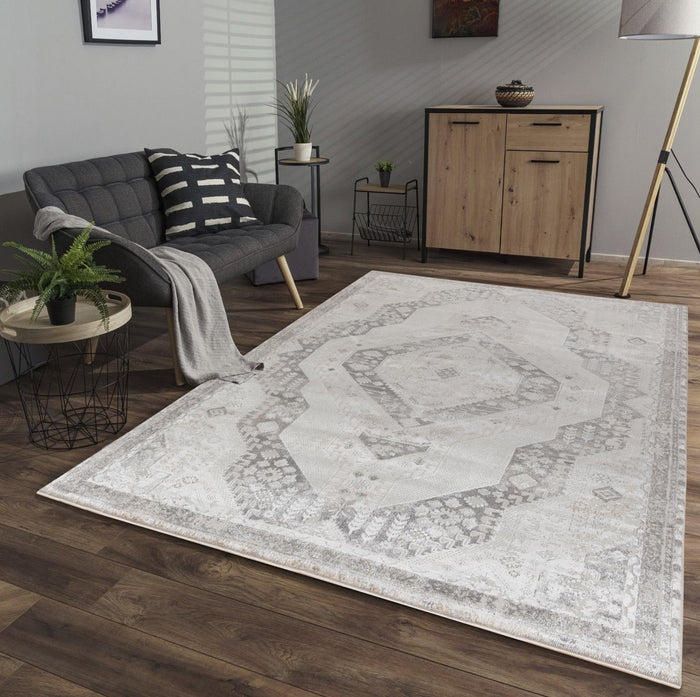 Omari 5X8 Area Rug - Adams Furniture