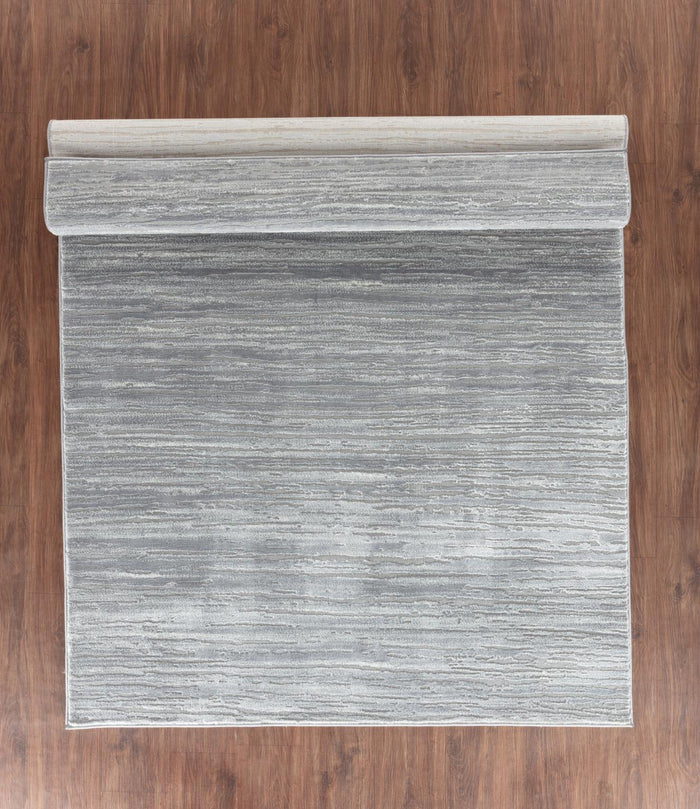 Petra 5X8 Area Rug - Adams Furniture