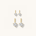 Round Diamond Bar earrings with a white topaz stone above a gold bar accent