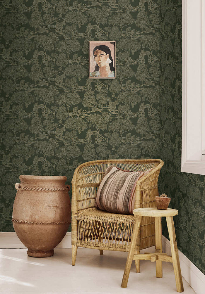 Samar Metallic Forest wallpaper in Green hung on a feature wall