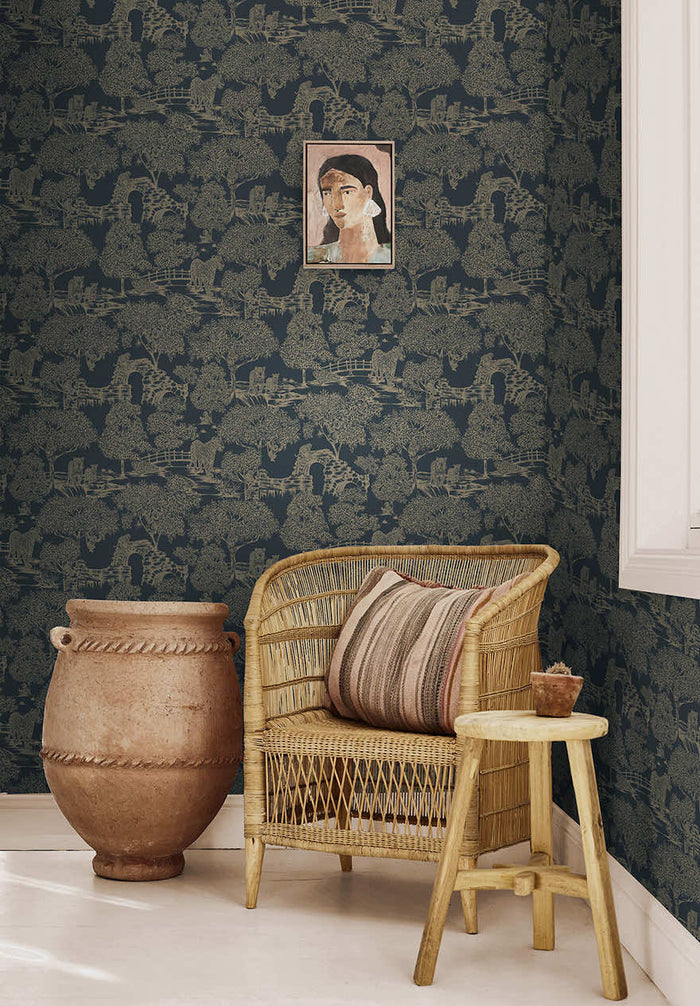 Samar Metallic Forest wallpaper in Navy hung on a feature wall