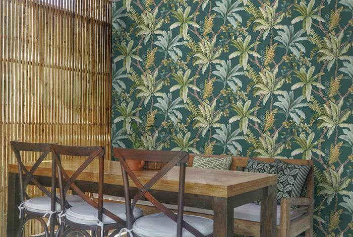 Saranda wallpaper in Teal hung on a feature wall