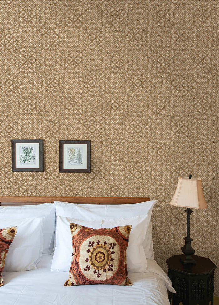 Sunstone wallpaper in Orange hung on a feature wall