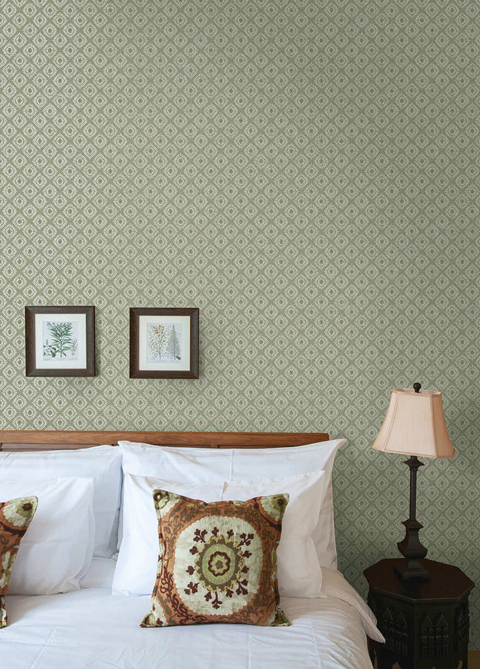 Sunstone wallpaper in Sage hung on a feature wall